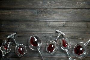 Wine background. Glasses of red wine. photo