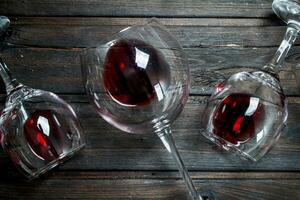 Wine background. Glasses of red wine. photo