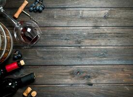 Wine background. Red wine with grapes. photo