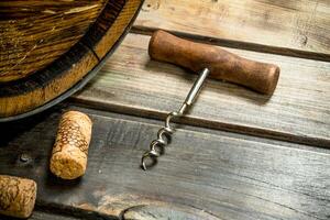 Corkscrew with corks. photo