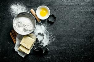 Sieve the flour and forms for baking cookies. photo