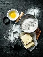 Sieve the flour and forms for baking cookies. photo