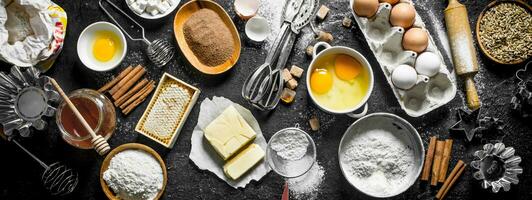 Baking background. Flour and various ingredients for dough. photo