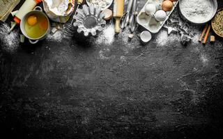 Flour with different baking forms of the dough. photo