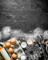 Eggs with forms for baking the dough. photo