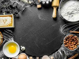 Baking background. Ingredients for the preparation of fresh dough. photo