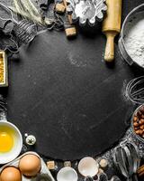 Baking background. Ingredients for the preparation of fresh dough. photo