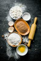 Baking background. Flour with cocoa and egg. photo