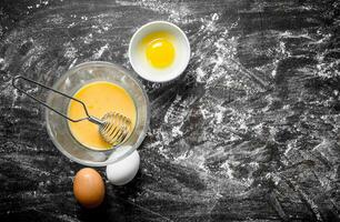 Eggs in bowls. photo