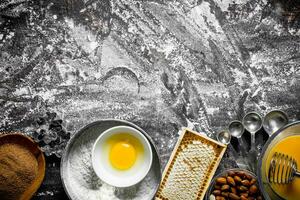 Baking background. Various ingredients for cooking homemade cookies. photo