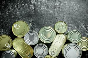 Various tin cans of canned food. photo