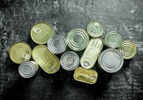 Various tin cans of canned food. photo