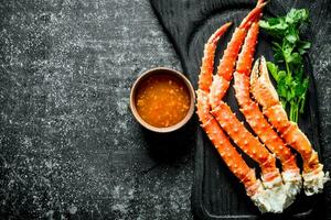 Fresh crab with parsley and sauce. photo