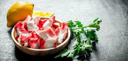 Crab meat with parsley and lemon. photo