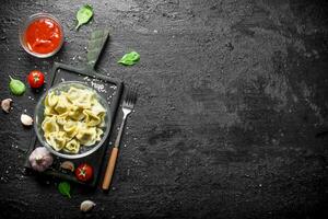 Dumplings with meat in a bowl. photo