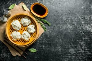 Fragrant manta dumplings with spices and soy sauce. photo