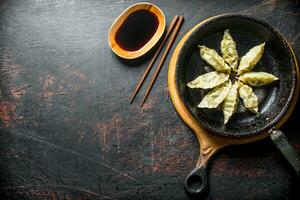 Fragrant Chinese gedza dumplings with meat. photo