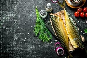 Smoked mackerel with spices and dill. photo