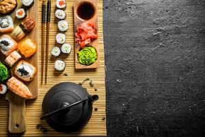 Traditional Japanese sushi, maki and rolls on a napkin. photo