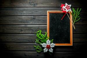 Empty Christmas frame with fir branches. photo