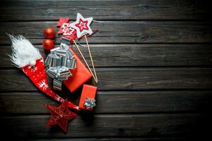 Christmas composition of red gift boxes and Christmas decorations. photo