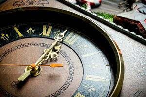 Christmas clock showing one minute to midnight. photo