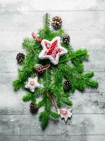 Christmas decorations with fir branches and cones. photo