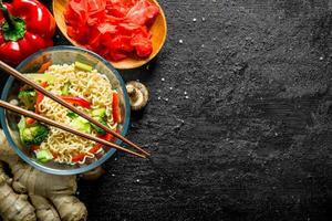 Readymade instant noodles with broccoli, pepper and ginger. photo