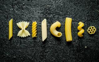 Different types of dry pasta. photo