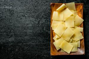 Raw pasta on a plate. photo