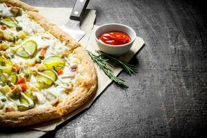 Vegetable pizza with tomato sauce in bowl. photo