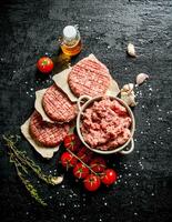 Minced beef Burger with tomatoes, oil and garlic. photo