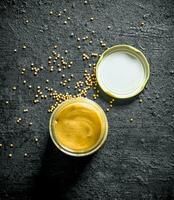 Mustard in a glass jar. photo