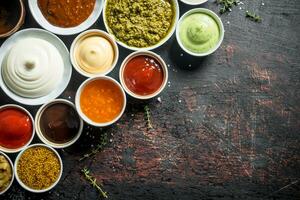 Range of different types of sauces. photo
