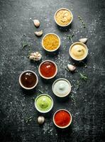 Bowls with different sauces. photo