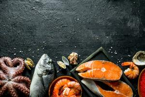 Stack of salmon on the cutting Board. photo