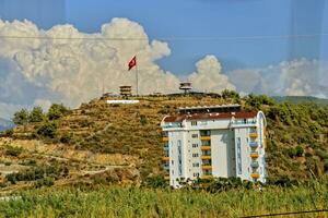 single lonely white houses by the Turkish highs in the mountains photo