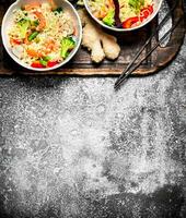 Asian food. Chinese noodles with vegetables. photo