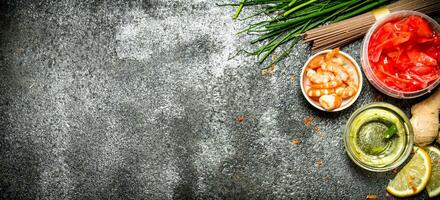 Asian food. Fresh ingredients for cooking Chinese food on a rustic background . photo