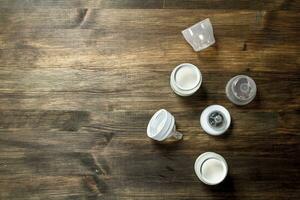 Baby food. Baby milk in small bottles. photo