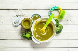 Baby food. Baby puree from broccoli. photo