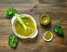 Baby food. Baby puree from broccoli. photo