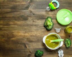 Baby food. Baby puree from broccoli. photo