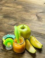 Baby food. Baby puree from green apples. photo