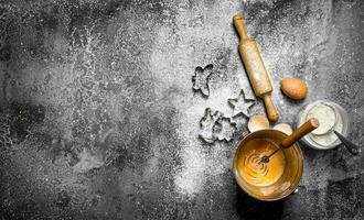 Baking background. Ingredients for the preparation of the biscuits for baking. photo