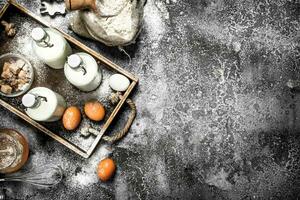 Baking background. Fresh ingredients for making dough. photo