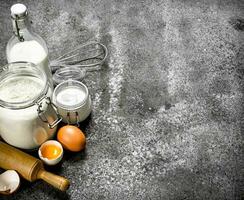 Baking background. Fresh ingredients for dough. photo