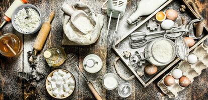 Baking background. Ingredients for fresh dough. photo