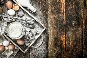 Baking background. Ingredients for fresh dough. photo