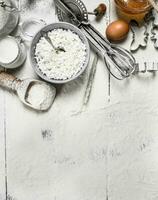 Tools and ingredients for the dough. photo